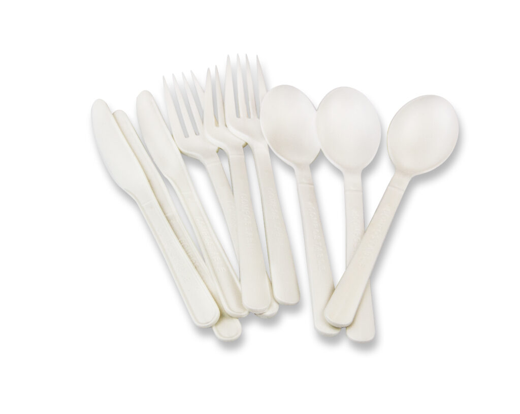 An arrangement of white cutlery.